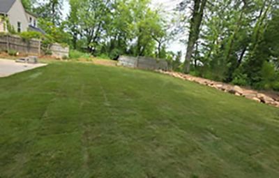 Residential Long Island sod installation for backyard lawn repair after construction or renovation.